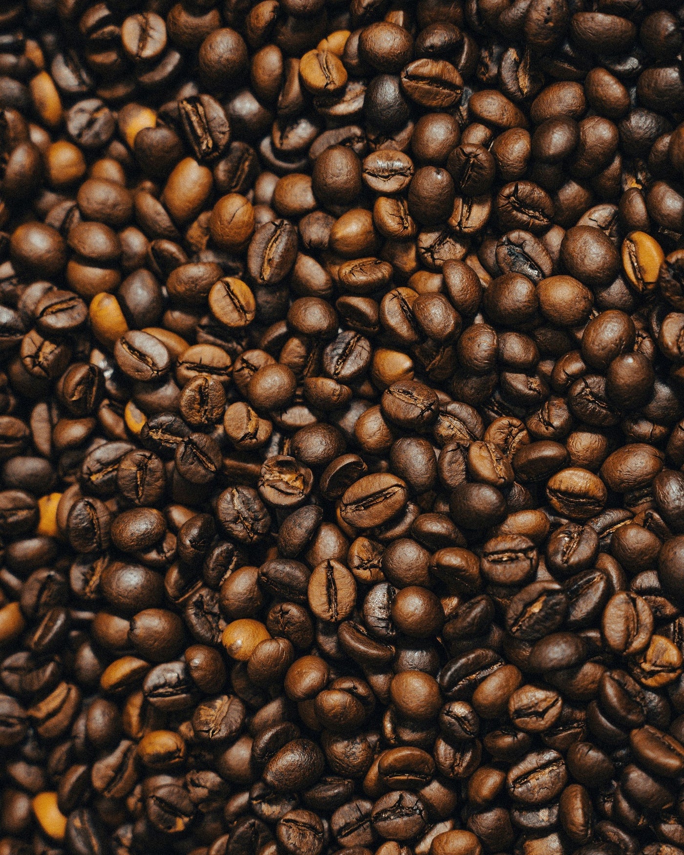 freshly roasted coffee beans filling the frame